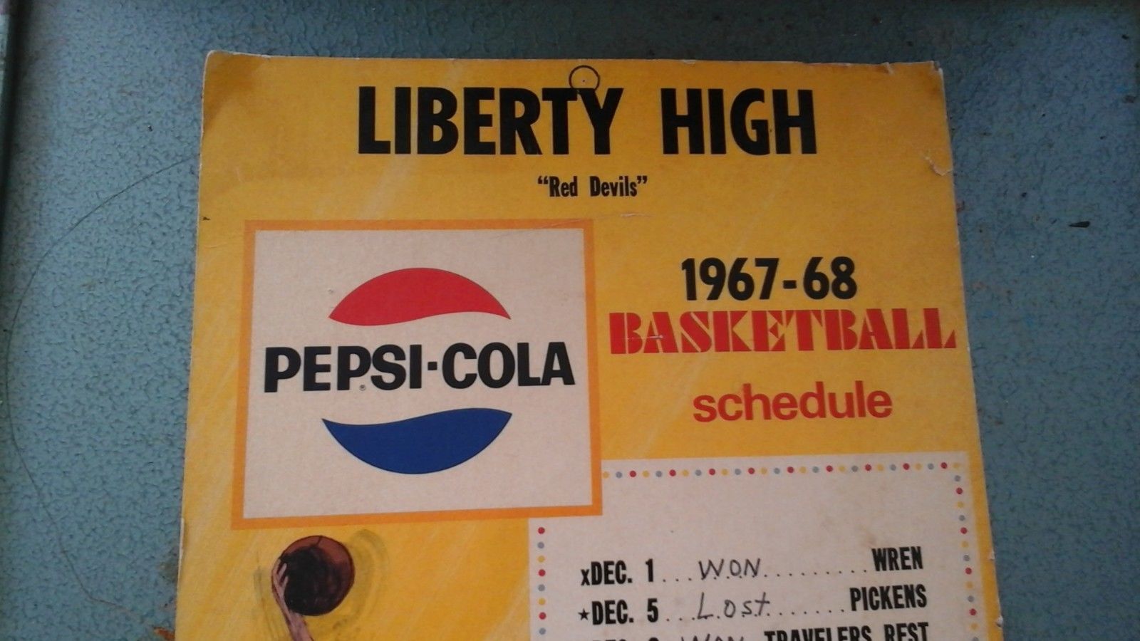 1967 High School Basketball Schedule Featuring the Text Cutting Through the ‘Globe’ Design Element